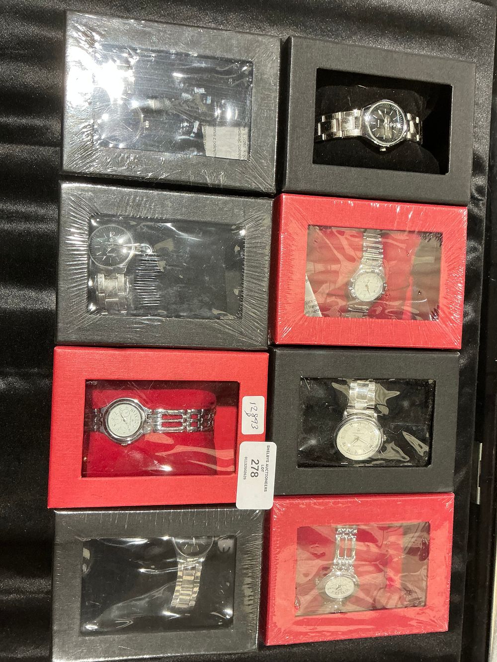 Lot 105: A Collection of Eight Silver Tone Quartz Wristwatches