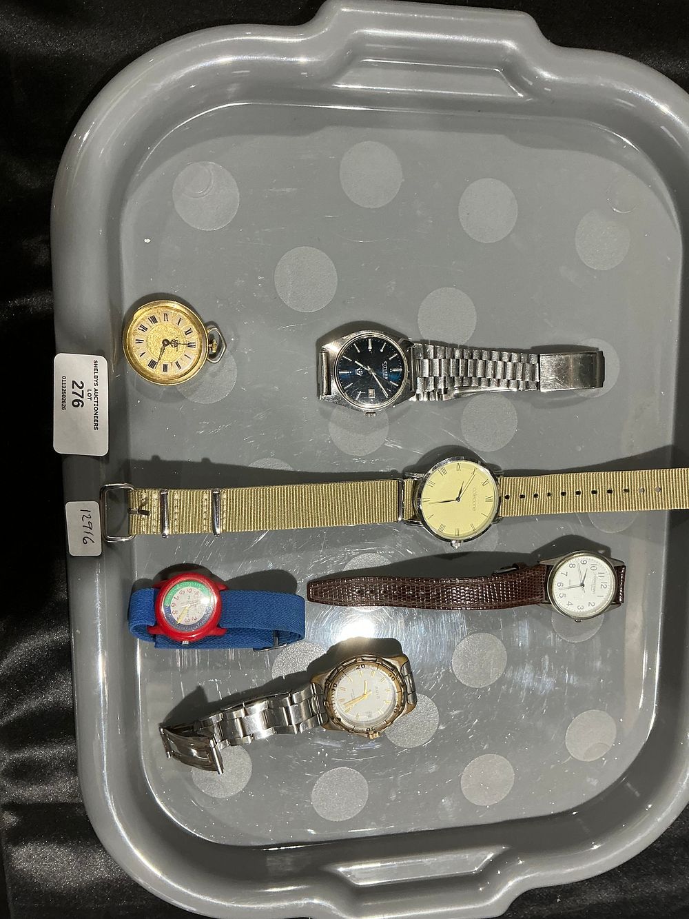 Lot 121: A Collection of Six Assorted Wristwatches and a Pocket Watch