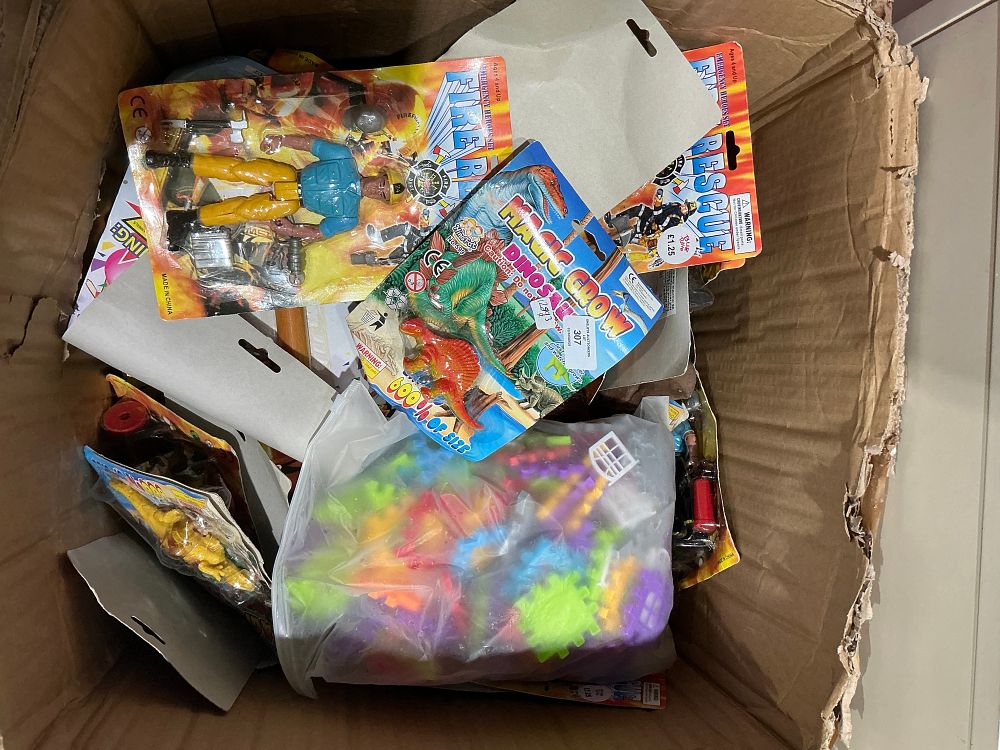 Lot 215: A Collection of Assorted Toys and Construction Blocks Including Carded Action Figures