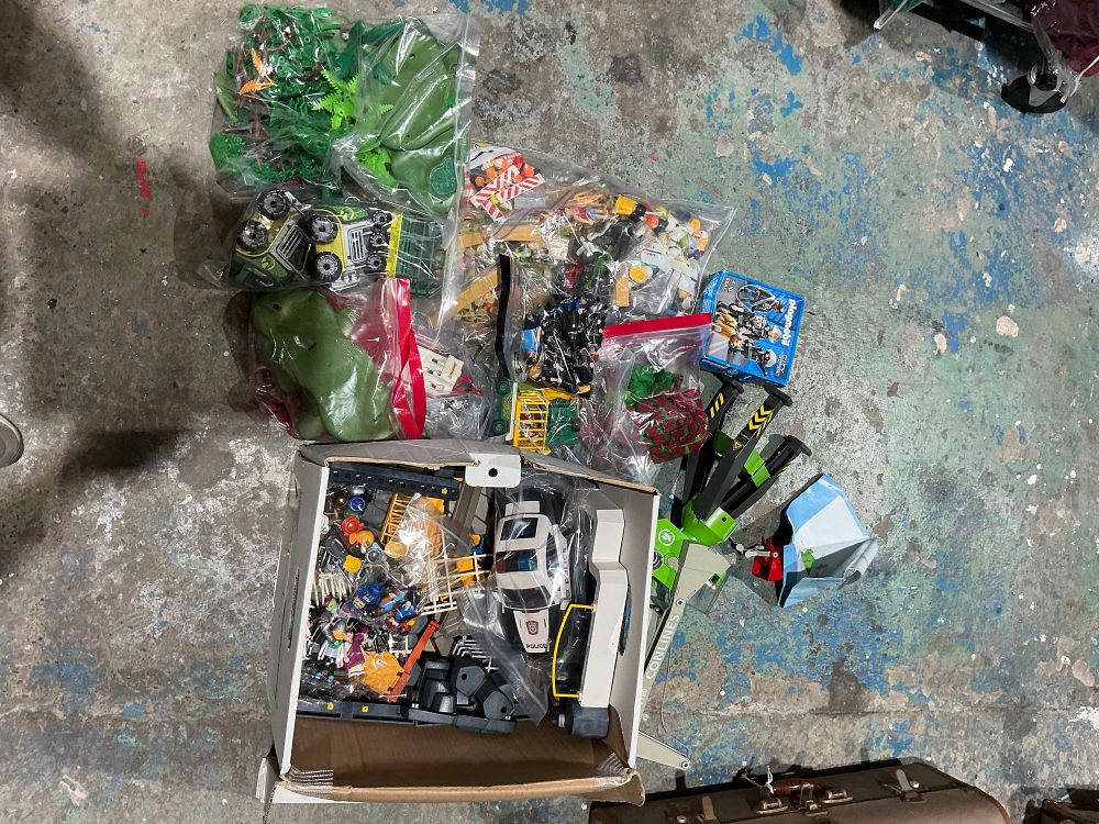 Lot 239: A Collection of Playmobil Figures, Vehicles, and Building Accessories