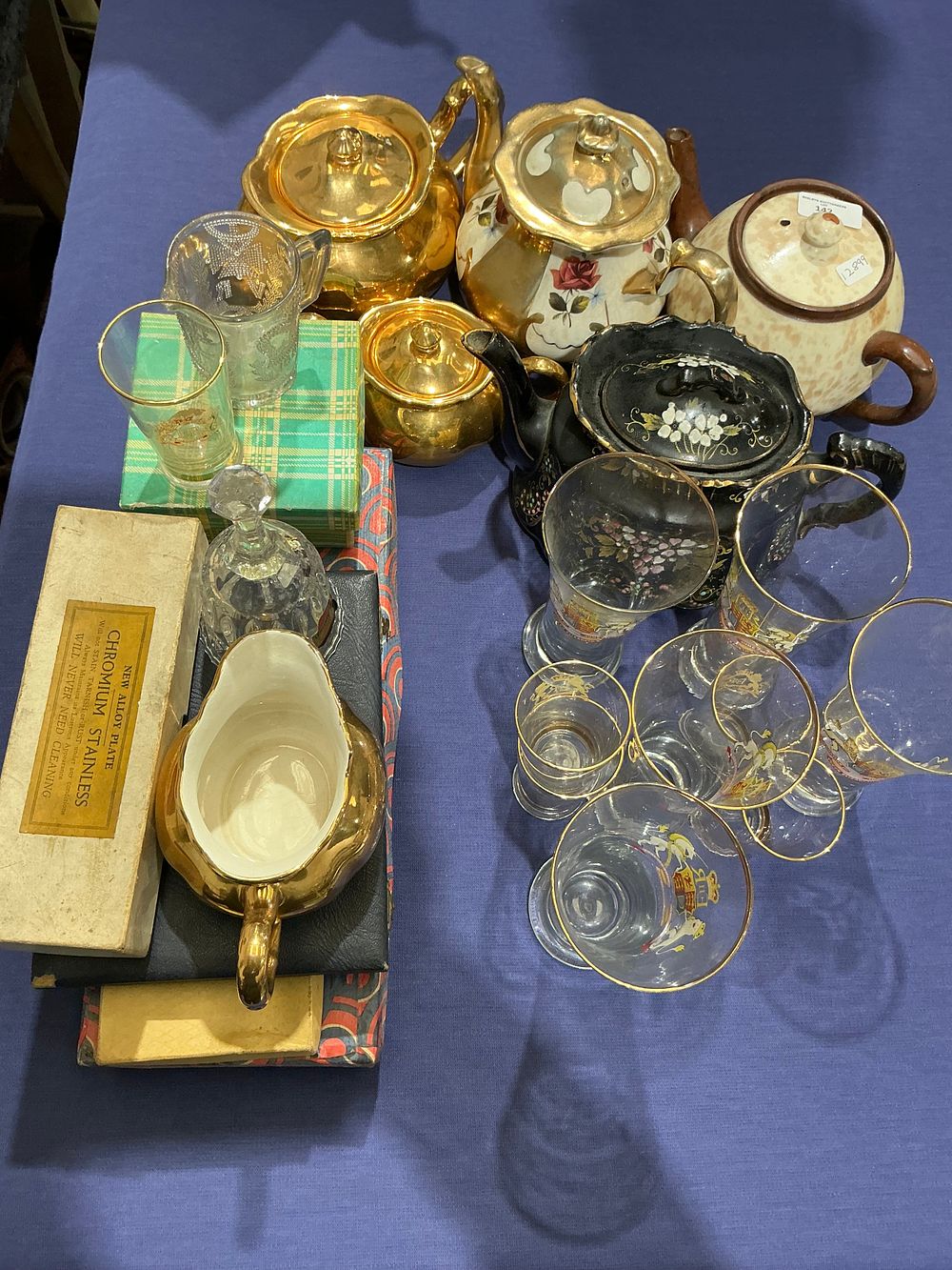 Lot 247: A Collection of Vintage Ceramic Teaware and Heraldic Glassware