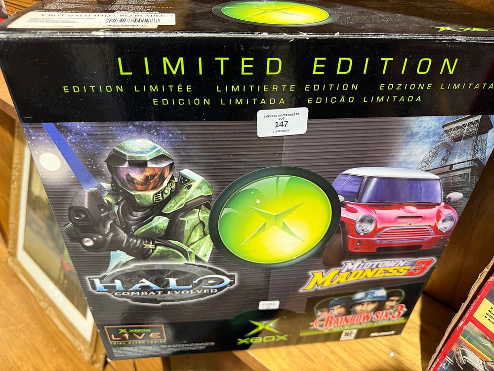 Lot 244: Microsoft Xbox Limited Edition Halo Combat Evolved Midtown Madness 3 and Rainbow Six 3 Console Bundle