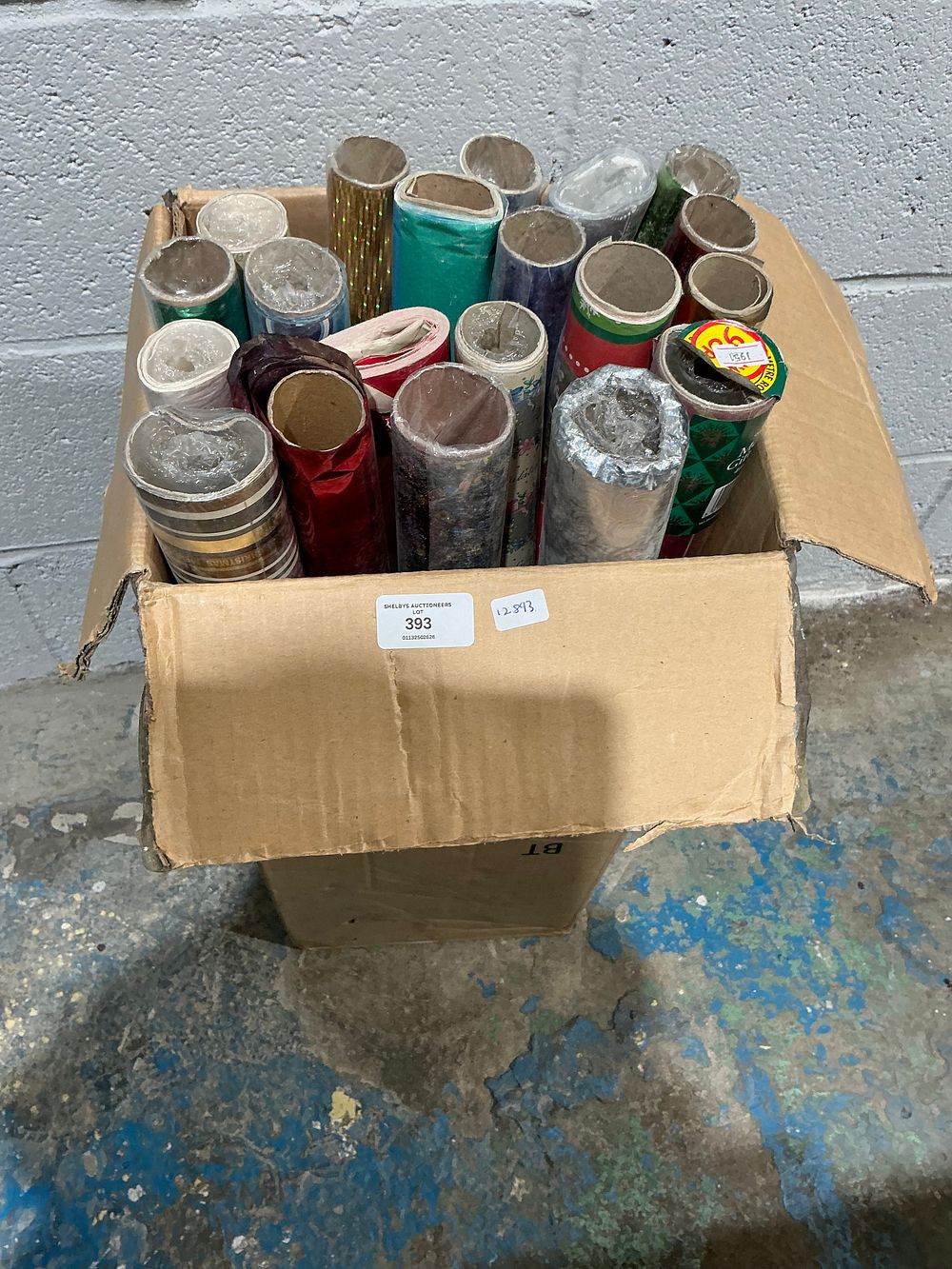 Lot 276: An Assortment of Gift Wrapping Paper Rolls
