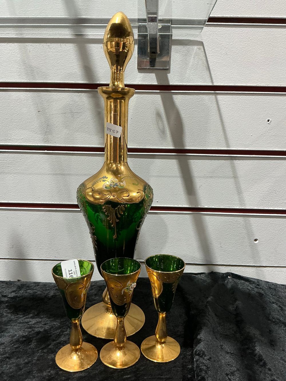 Lot 311: A Bohemian Emerald Green and Gold Gilt Decanter and Glass Set