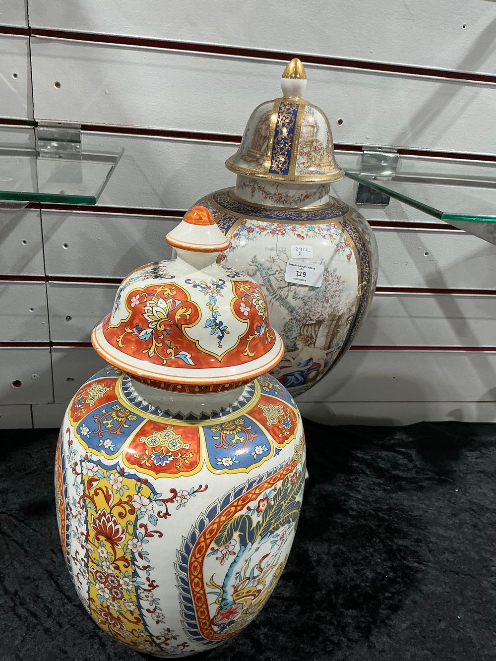 Lot 331: Two Large Ceramic Ginger Jars with Lids one does have a big crack