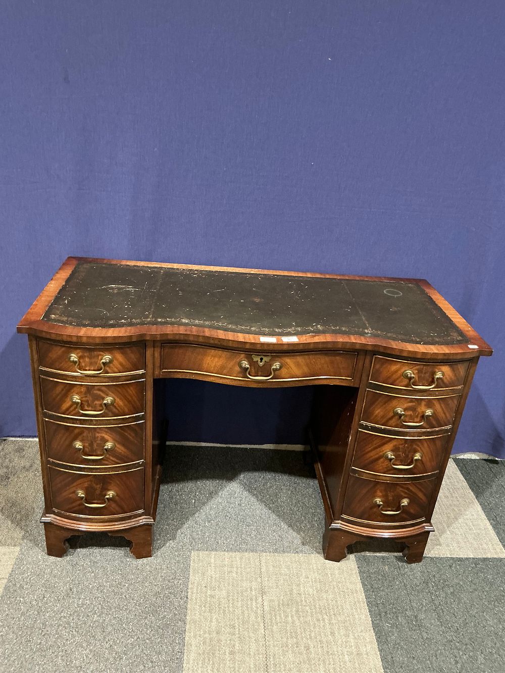 Lot 36: George III Style Mahogany Serpentine Pedestal Desk with Leather Inset Top