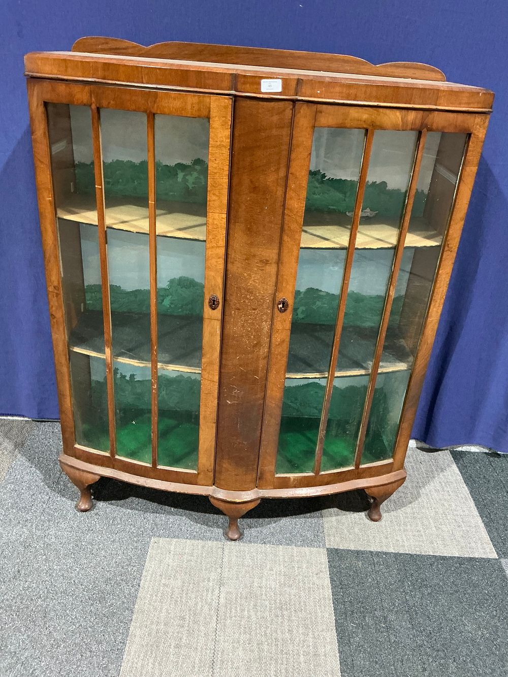 Lot 40: Mid-20th-Century Bow-Fronted Mahogany Veneered Display Cabinet