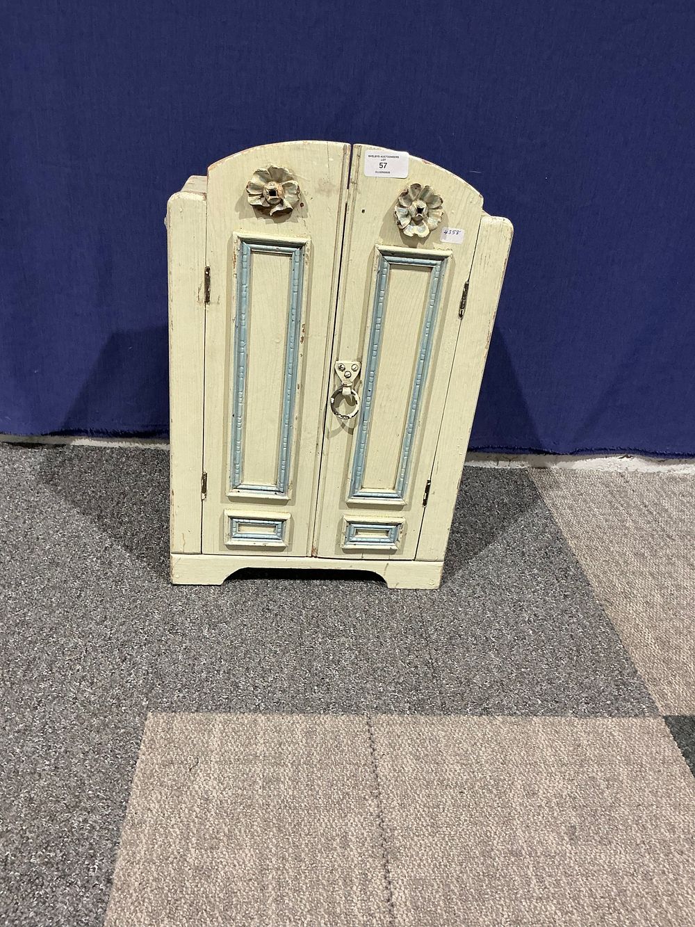 Lot 57: Painted Wooden Doll Armoire with Miniature Clothes and Accessories