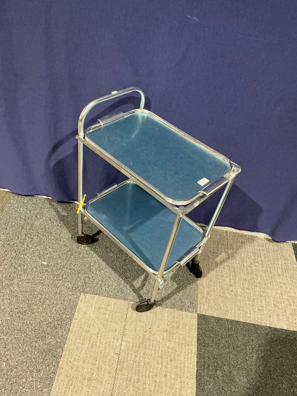 Lot 77: Mid-20th Century Folding Two-Tier Serving Trolley with Blue Trays