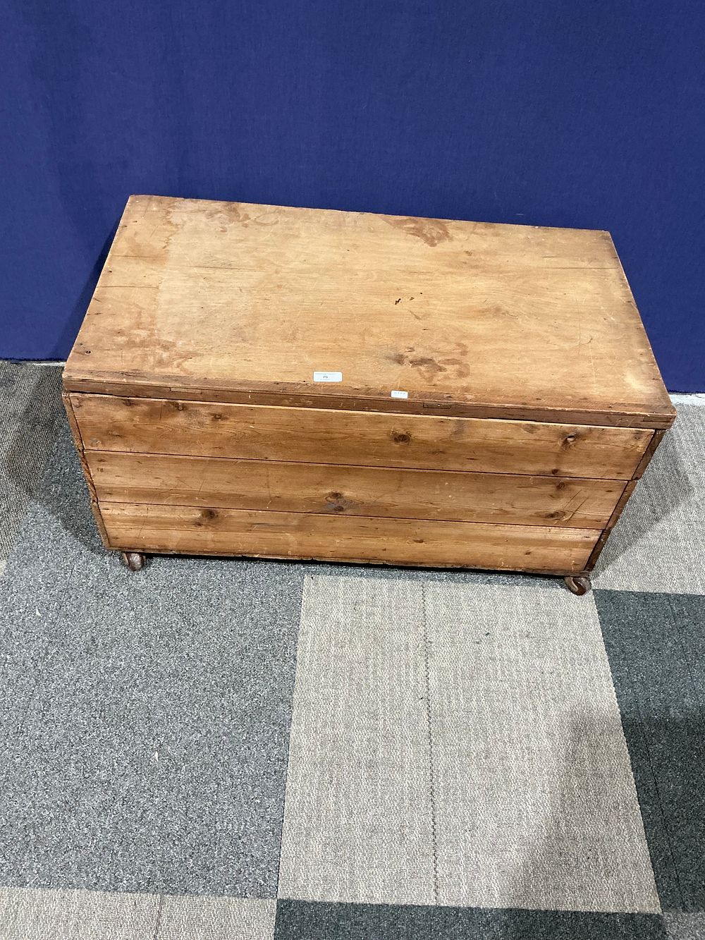 Lot 79: Rustic Plank-Built Pine Blanket Box on Castors