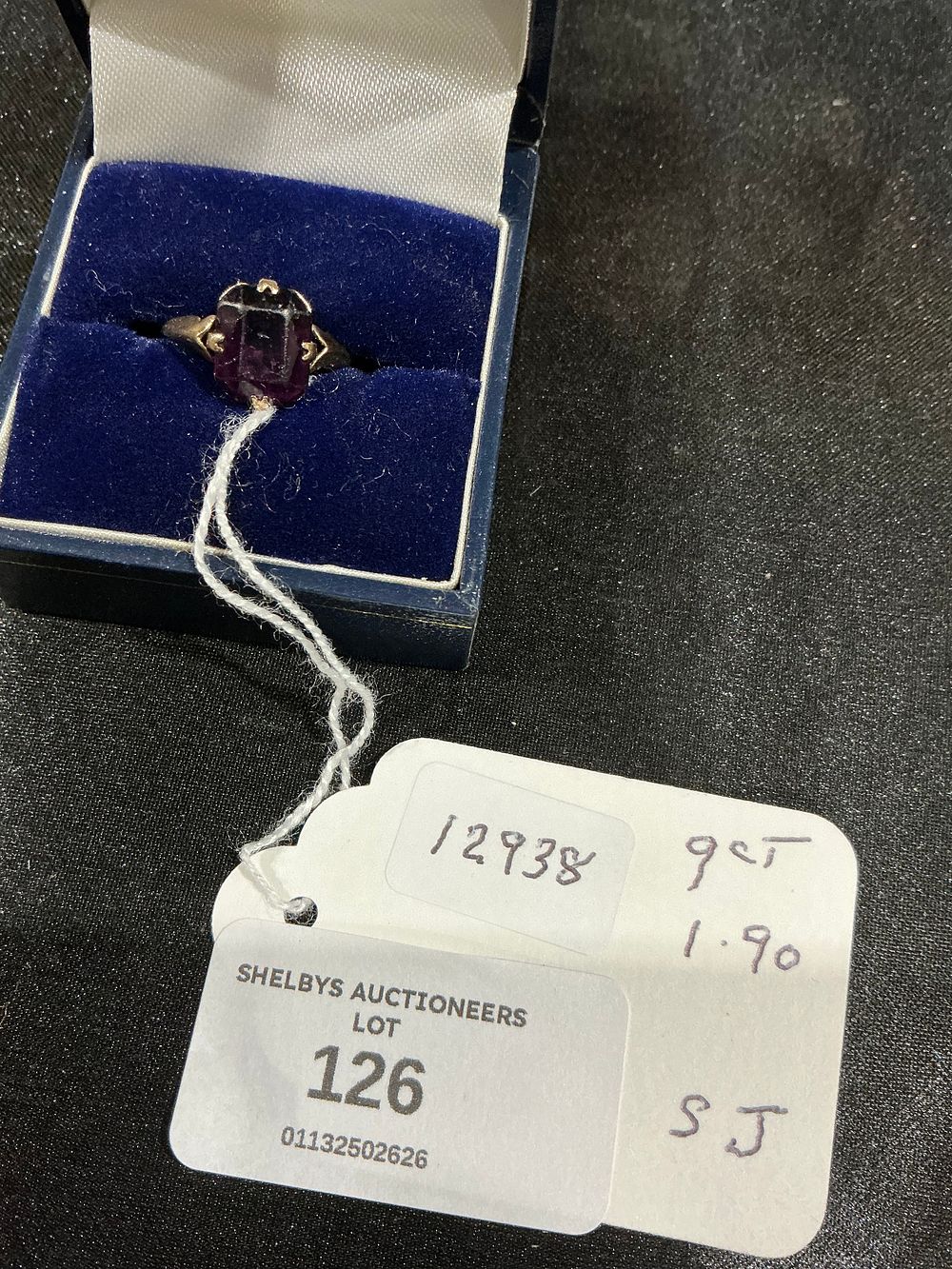 Lot 126: A 9 Carat Gold and Amethyst Emerald Cut Cocktail Ring 1.9 gram size J