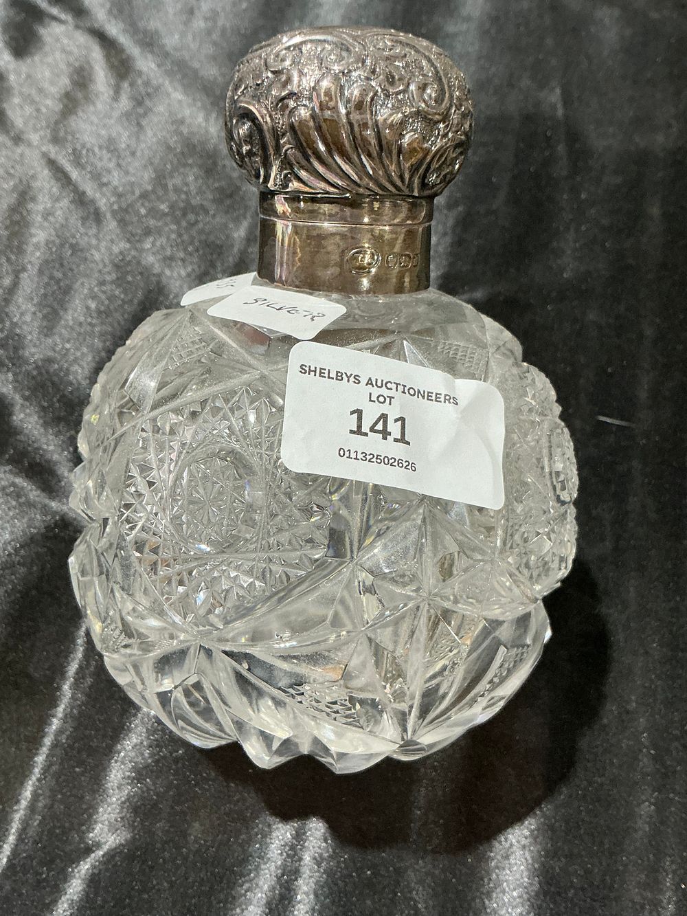 Lot 141: Silver Mounted Cut Glass Scent Bottle