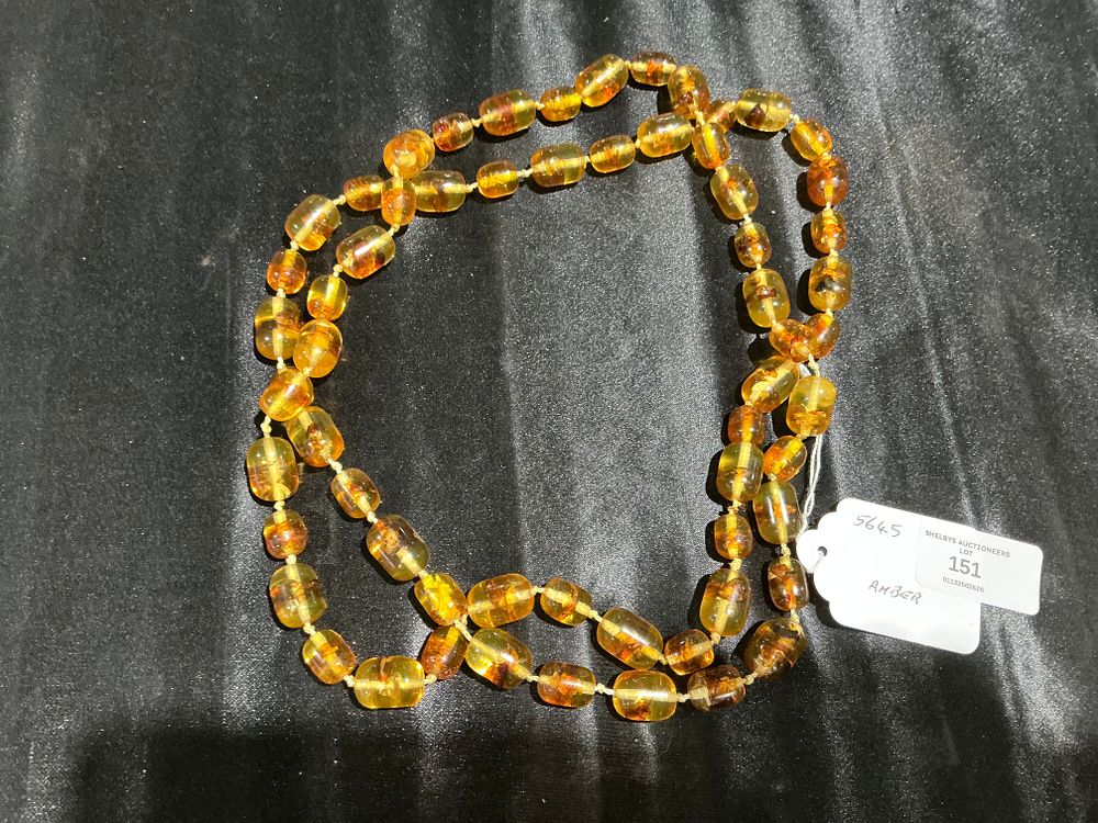 Lot 151: A Continuous Strand of Natural Amber Beads