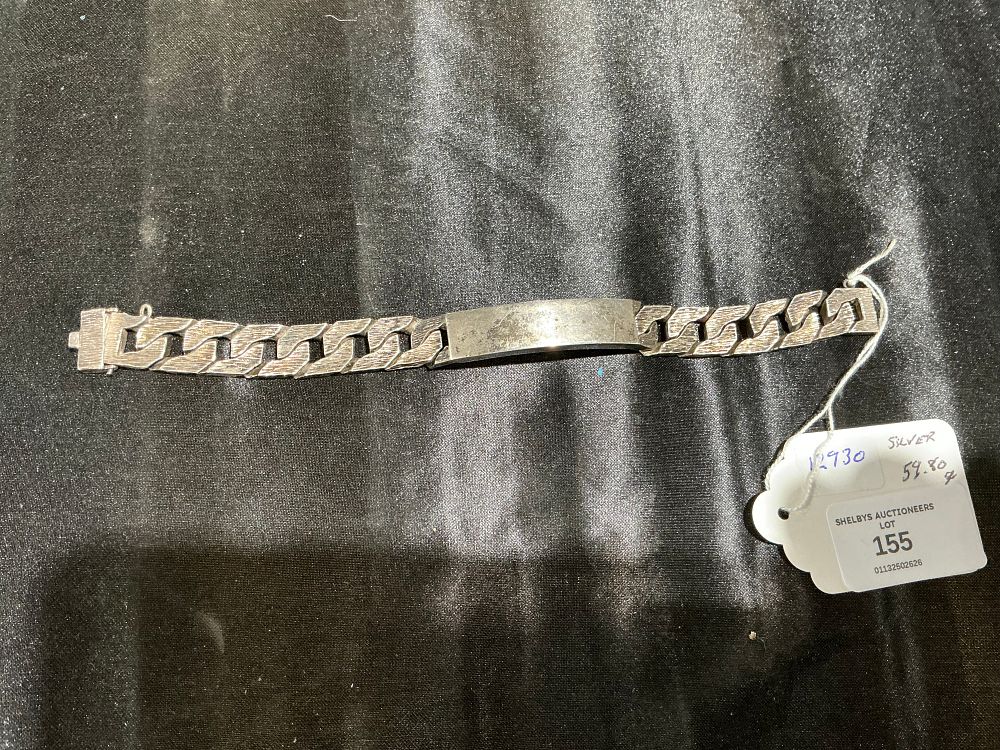 Lot 155: A Vintage Heavy Sterling Silver Identity Bracelet by C & T Birmingham 1979 59.8 gram