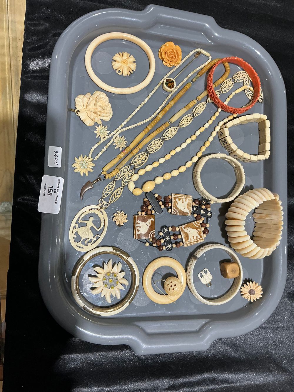 Lot 158: A Collection of Vintage Carved Bone and Early Plastic Costume Jewellery