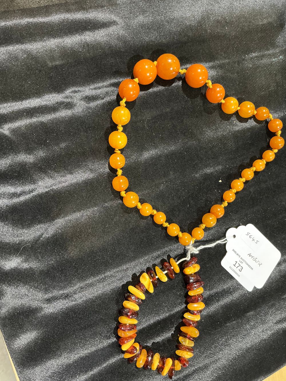 Lot 173: Two Pieces of Amber Jewellery Comprising a Graduated Bead Necklace and a Mixed Amber Bracelet