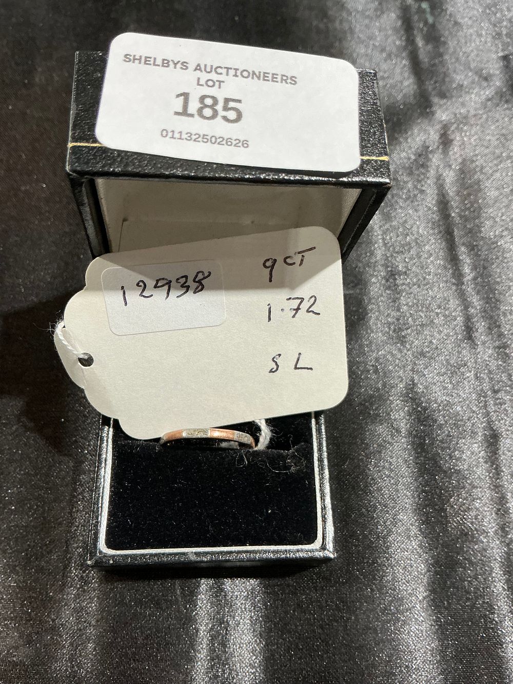Lot 185: A 9 Carat Gold Band Ring 1.72 gram size L