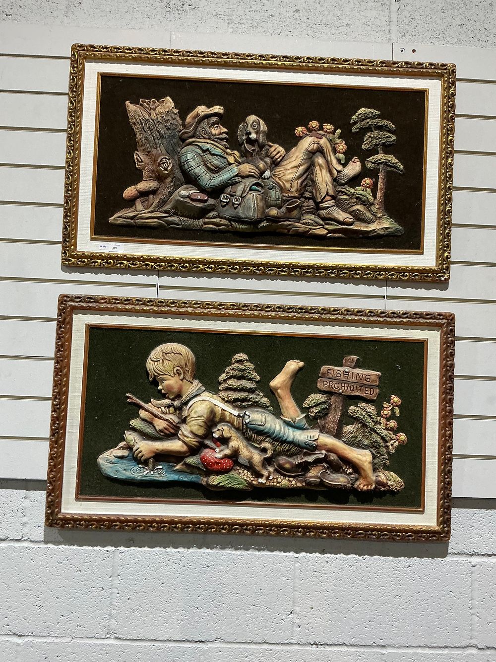 Lot 199: A Pair of Framed High Relief Three Dimensional Wall Plaques Depicting Rustic Scenes