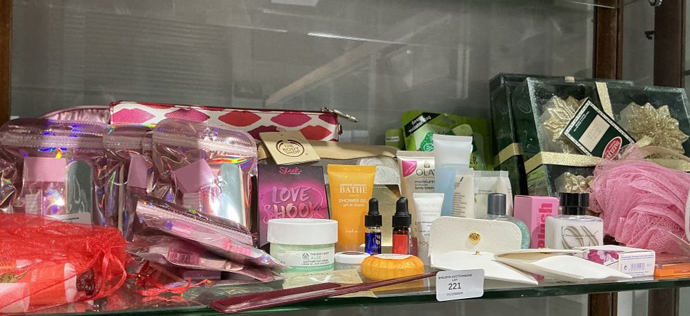 Lot 221: A Large Collection of Assorted Cosmetics, Toiletries, and Beauty Accessories Including The Body Shop, Olay, and Ormonde Jayne