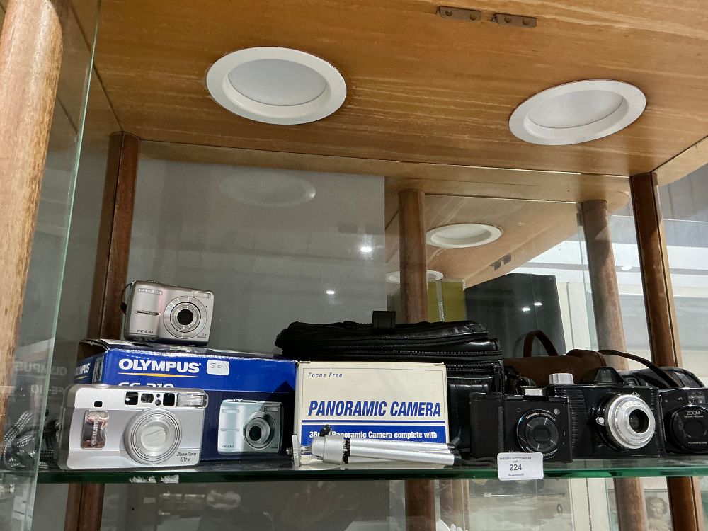 Lot 224: An Assortment of Olympus and Other Compact Film and Digital Cameras