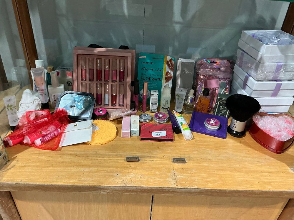 Lot 229: An Assortment of Cosmetics and Skincare Products Including The Body Shop, Mary Kay, and Technic