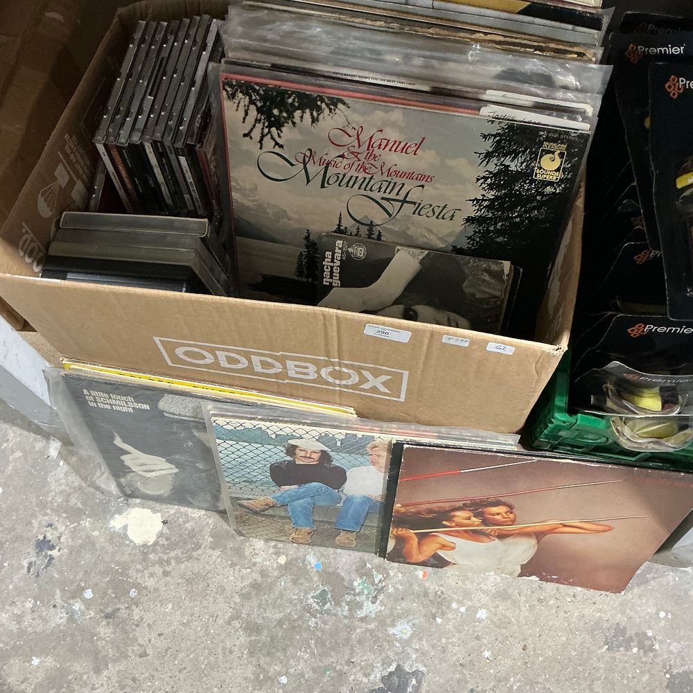 Lot 290: An Assortment of Vinyl LPs and CDs including Simon & Garfunkel, Harry Nilsson, and Adele