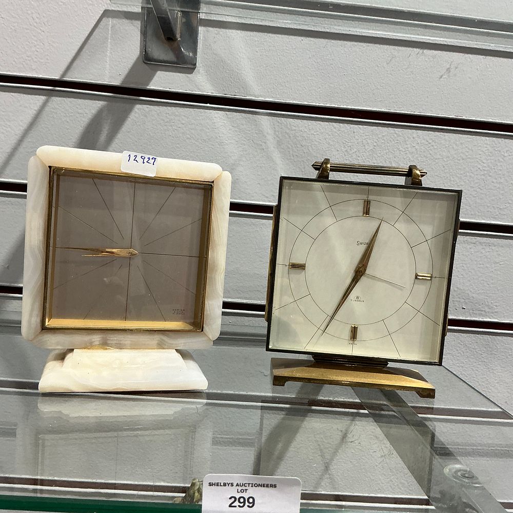 Lot 299: Two Swiss 8-Day Mechanical Desk Clocks by Swiza and Carina