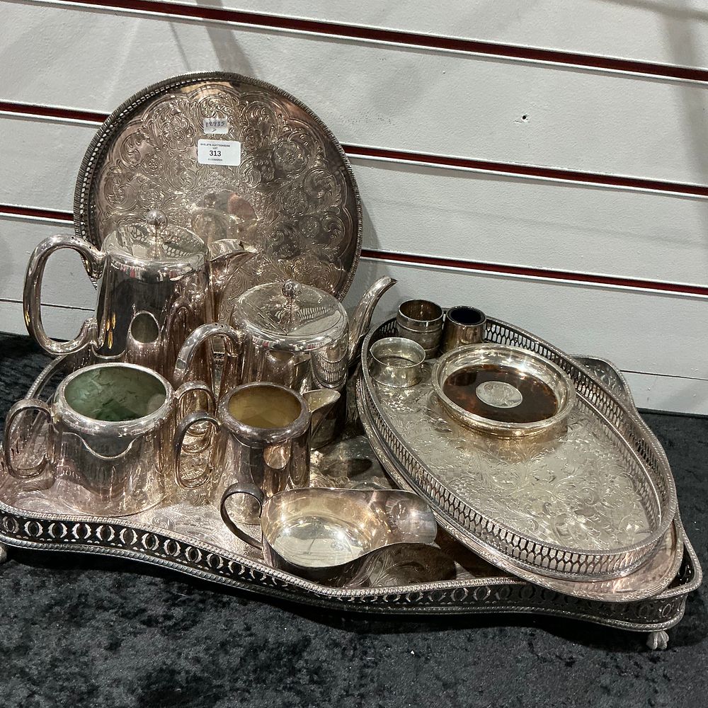 Lot 313: A Collection of Silver Plated Tea and Coffee Service Items with Trays