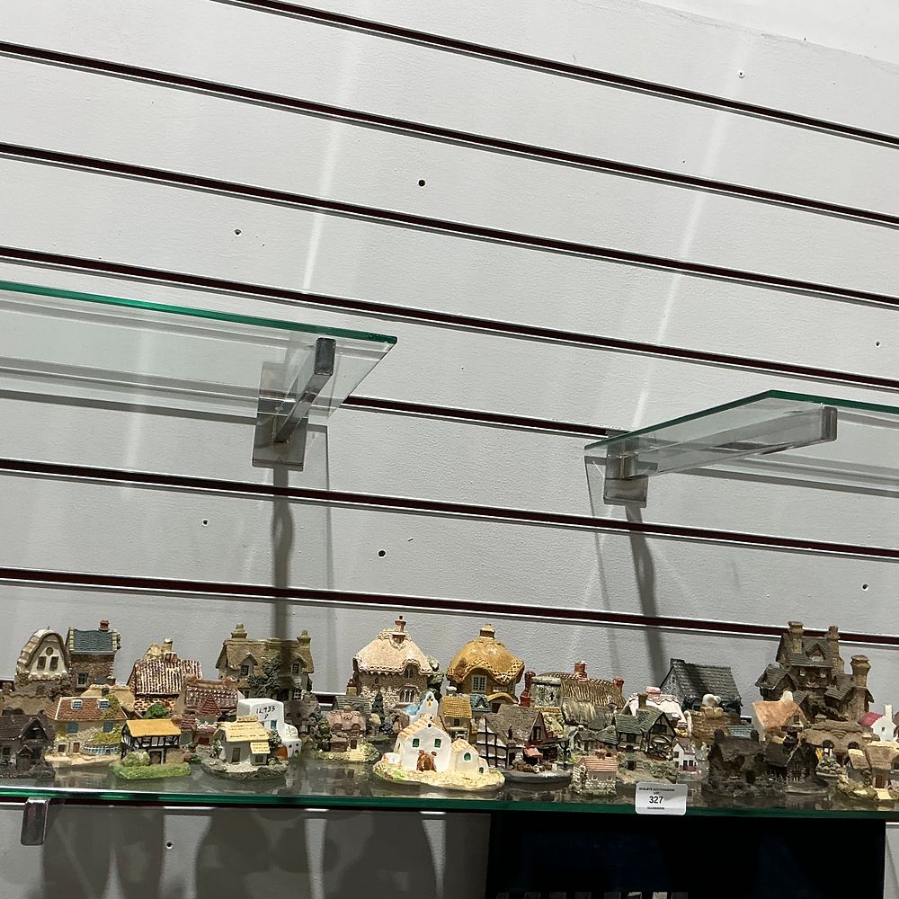 Lot 327: A Large Collection of Miniature Vernacular Architectural Cottages and Village Buildings