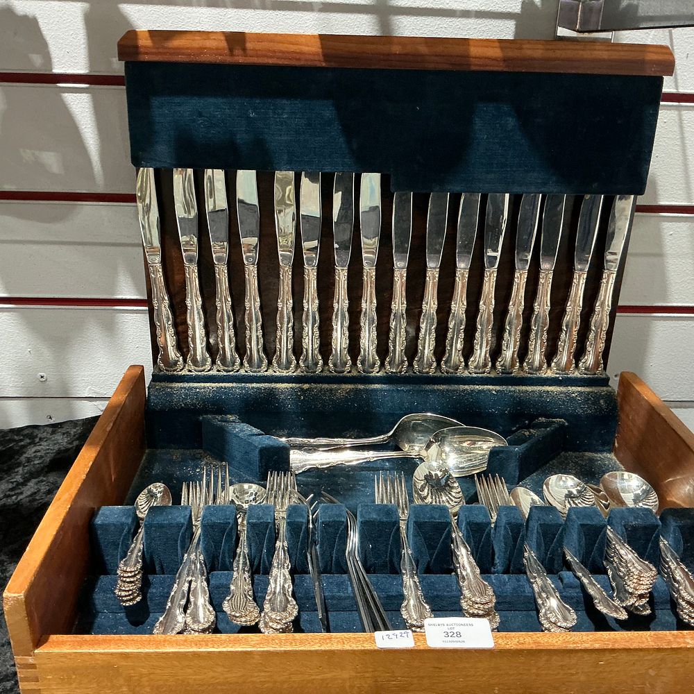 Lot 328: A Cased Silver Plated Flatware Service in Kings Pattern