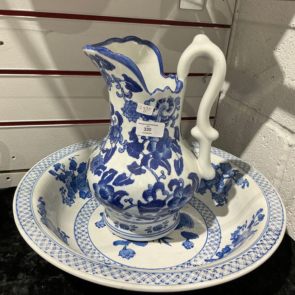 Lot 330: A Victorian Blue and White Transfer-Printed Ironstone Wash Jug and Basin Set