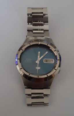 שעון סייקו 5 SEIKO מנגנון אוטומטי, 21 אבנים, תאריכון ויום בשבוע, לוח כחול. המנגנון וכיוון 