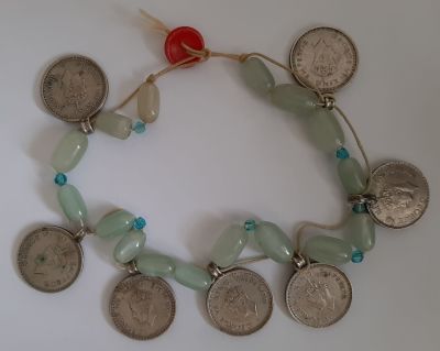 7 מטבעות אחד רופי כסף מהשנים 1940, 1942, 1943, 1944, 1945 (הודו תחת השלטון הבריטי) משולבים 