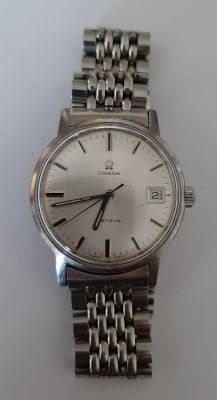 OMEGA - שעון אומגה וינטג' מתיחה , השעון עובד. קוטר 34 מ"מ. רצועת מתכת לא מקורית.