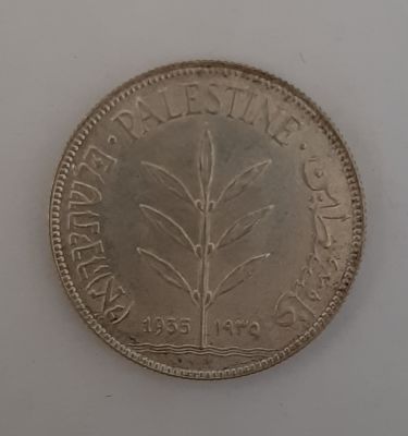 מטבע כסף 100 מיל פלשתינה שנת 1935. מצב UNC. מחיר קטלוגי ISRANUMIS לפי 350 דולר.