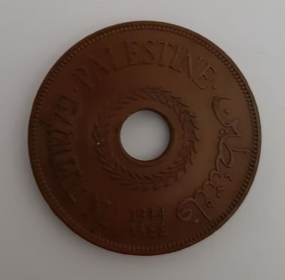 מטבע 20 מיל פלשתינה ארץ ישראל שנת 1944 AUNC -UNC מטבע במצב חדש . נדיר למצוא מטבע זה במצבו.