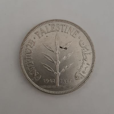 מטבע כסף 100 מיל 1942 ארץ ישראל פלשתינה במצב UNC.