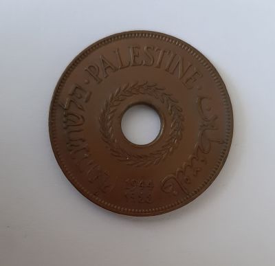 מטבע 20 מיל מכסף שנת 1944 מברונזה. פלשתינה ארץ ישראל במצב AU /+XF (אולי UNC). מחיר קטלוגי 