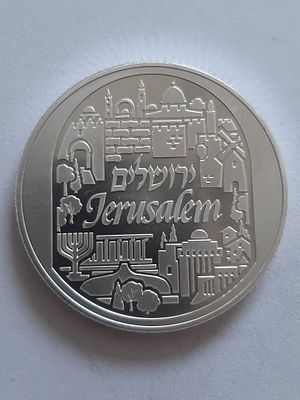 מדליה בוליון כסף טהור 999 במשקל אונקיה 31.1 גרם, שנת 2023. קוטר 38.5 מ"מ. ירושלים.