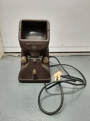 מכשיר עריכה של סרטים/ פילמים ישן מאד ממתכתכת מאסיבית מוביסקופ moviscop של יברת zeiss ikon 