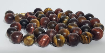 שרשרת עין הנמר שני גוונים . חרוזים גדולים . 
מידה : 61 סמ 
כל חרוז 1.2 סמ . קשרים 