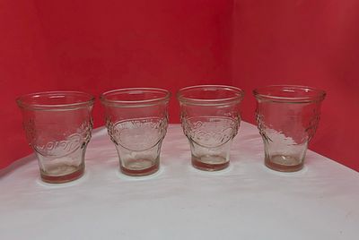 לוט של 4 כוסות פרסומת קריסטל . 
מידה: 7.5 על 6.5 סמ