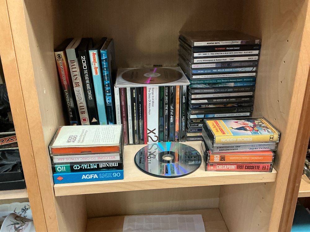 Lot 183: An Assortment of Mixed Media including VHS, DVD,...