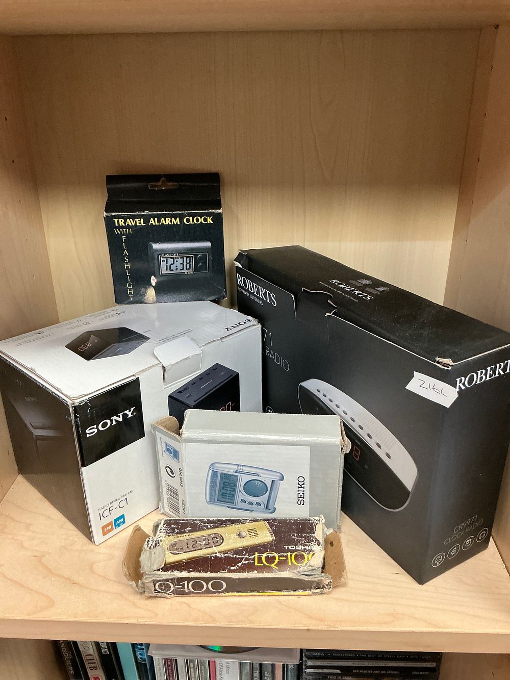 Lot 184: A Collection of Boxed Clock Radios and Portable...