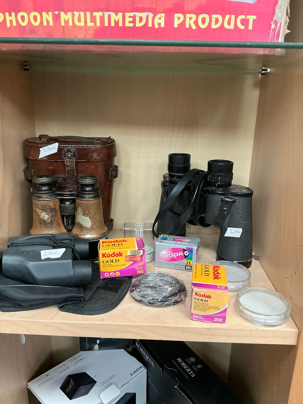 Lot 185: A collection of vintage and modern binoculars and...