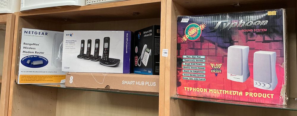 Lot 186: A Collection of Boxed Home Networking and Telecommunication...