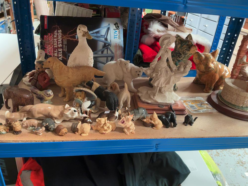 Lot 217: A Collection of Decorative Ceramic, Porcelain, and Resin...
