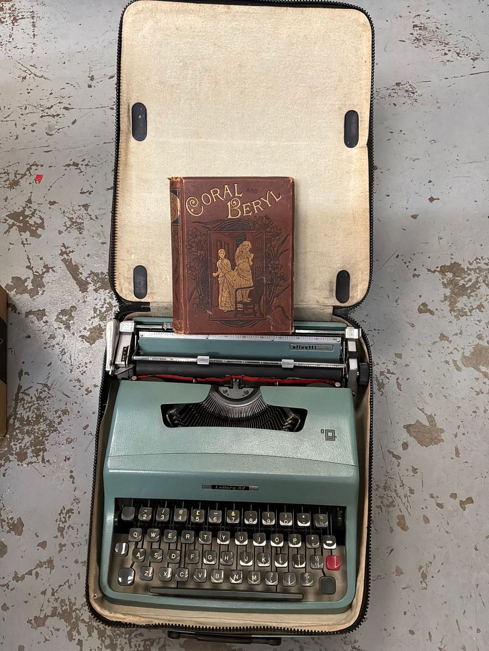 Lot 291: An Olivetti Lettera 32 Portable Typewriter and an...