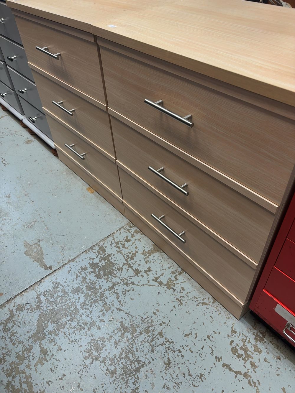 Lot 304: A Pair of Contemporary Three-Drawer Chests in the...