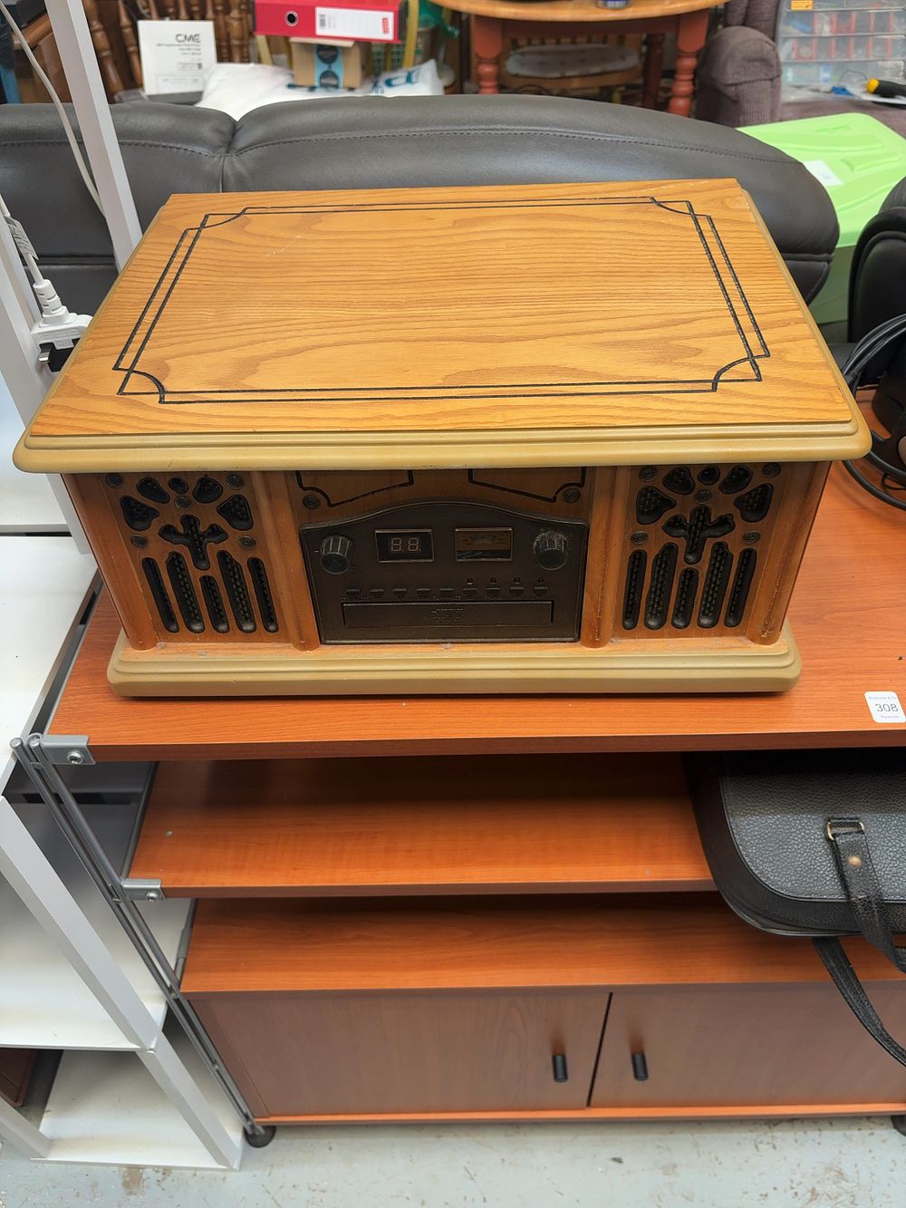 Lot 307: A Retro-Style Wood-Cased Multi-Function Music System Attributed to...